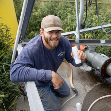 NRD Employee Takes Water Sample