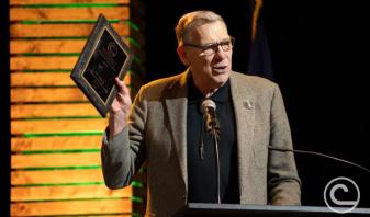 Orval Gigstad with Award