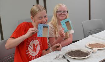 Students create a soil profile.