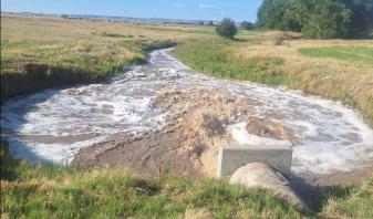 Water release from the Wildhorse 5A Dam structure near Bayard, Nebraska.
