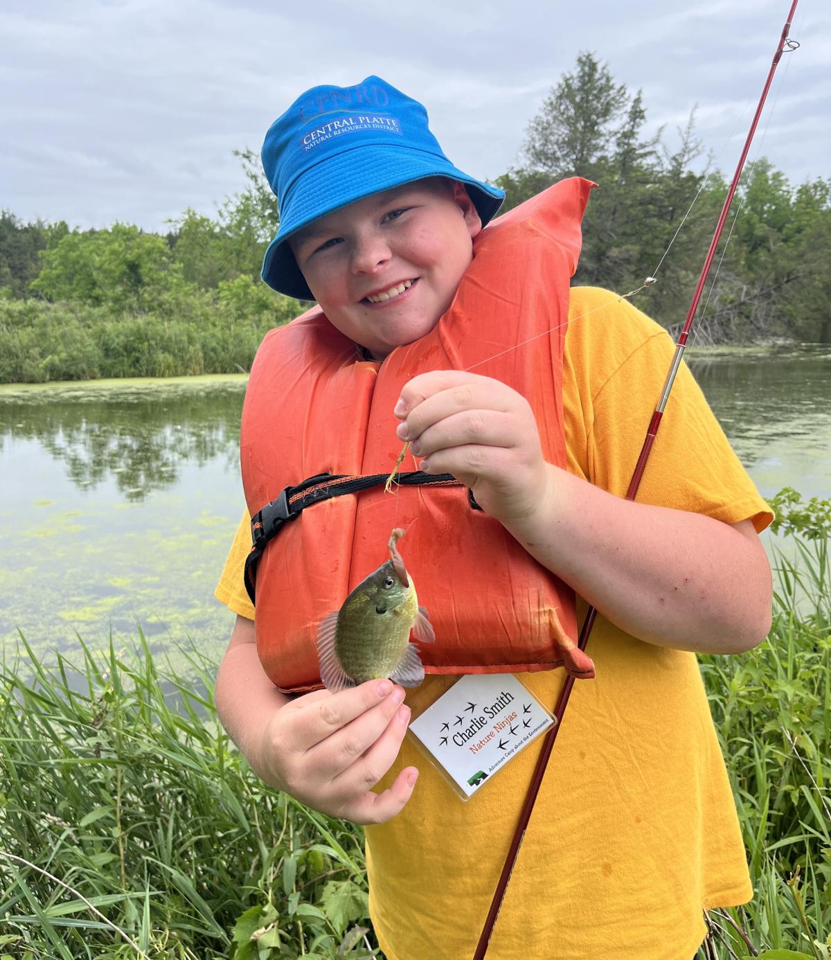 ACE Camper with a fish