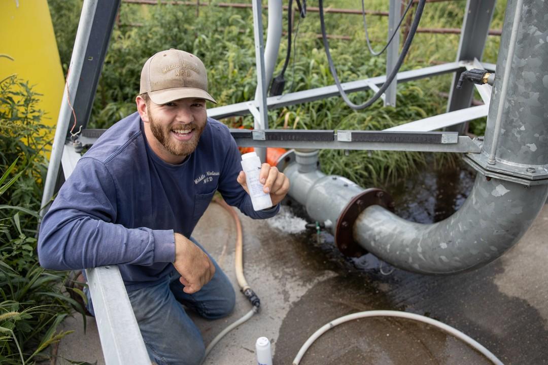 NRD Employee Takes Water Sample