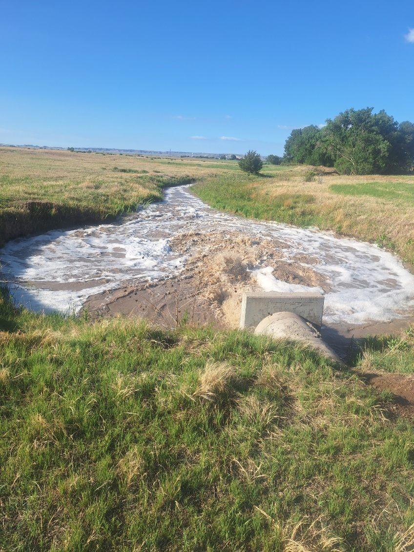 Water release from the Wildhorse 5A Dam structure near Bayard, Nebraska.