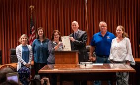 Left to Right: Representatives from The Nature Conservancy of Nebraska, Humanities Nebraska, Governor Pete Ricketts, Nebraska Association of Resources Districts, and the Nebraska Department of Natural Resources.